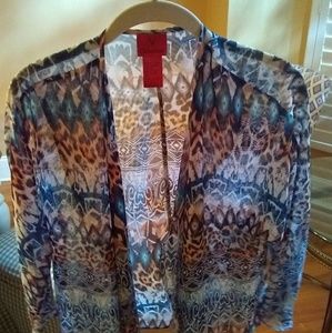 A sleeveless dress and a jacket